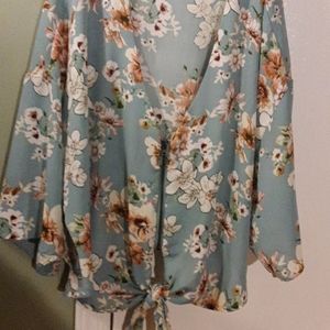 Beautiful blouse with dolman sleeves tied at botto